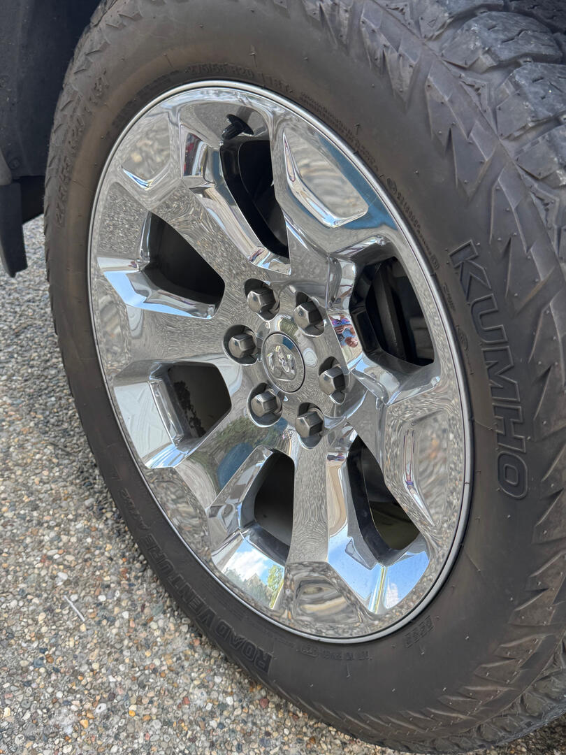 Dirty truck wheel and tire before detailing